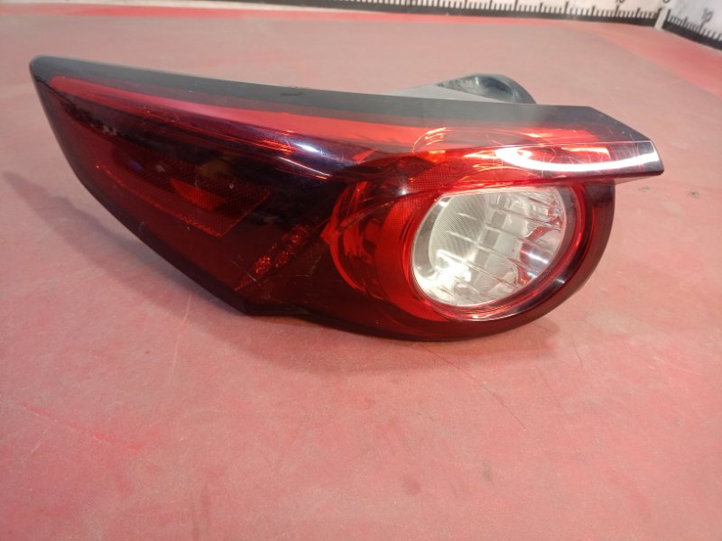 Фонарь заднего хода задний левый Mazda CX-9 2017 2.5L TK5051160B Б/У